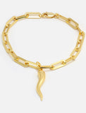 18K Gold vermeil (sterling silver) chain bracelet with a unique pendant on a wrist against a neutral background. Inspired by centuries-old Italian tradition, this modern chain bracelet features the Italian horn charm, also known as the cornicello — a powerful symbol of protection, good fortune, and strength. Designed by AAPI celebrity jewelry designer SONIA HOU.
