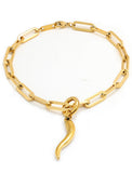 18K Gold stainless steel (waterproof) chain bracelet with a unique clasp worn by a person in a brown long-sleeve shirt. Inspired by centuries-old Italian tradition, this modern chain bracelet features the Italian horn charm, also known as the cornicello — a powerful symbol of protection, good fortune, and strength. Designed by AAPI celebrity jewelry designer SONIA HOU.
