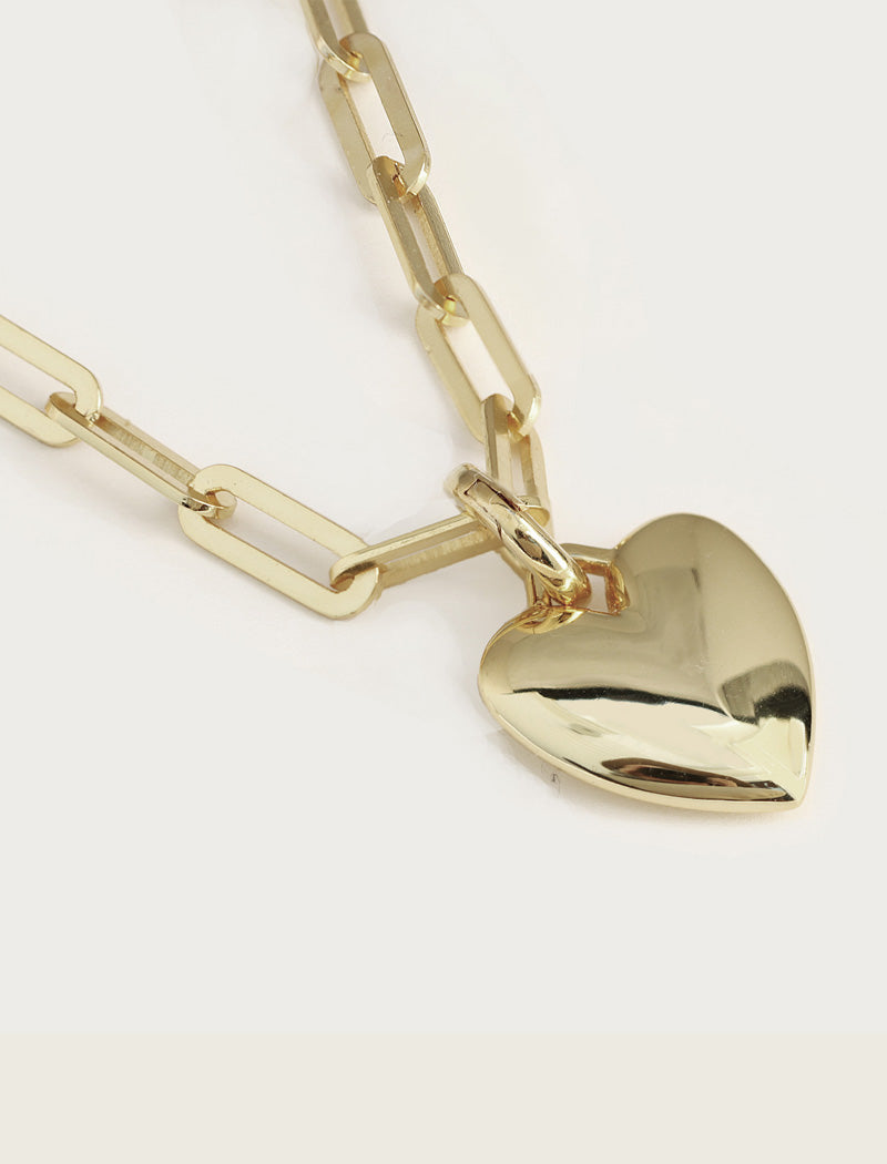 Sterling Silver heart-shaped pendant on a silver chain against a white background. A modern expression of love and strength, this Puffy Heart Necklace reimagines the classic heart symbol with a fresh, contemporary twist. Designed by AAPI celebrity jewelry designer SONIA HOU.

