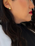 Woman wearing Puffy Heart Stud Earrings in 18K Gold Over Sterling Silver by AAPI Asian Celebrity Jewelry Designer Sonia Hou - Perfect for Valentine's Day Gift, Mother's Day, Anniversary