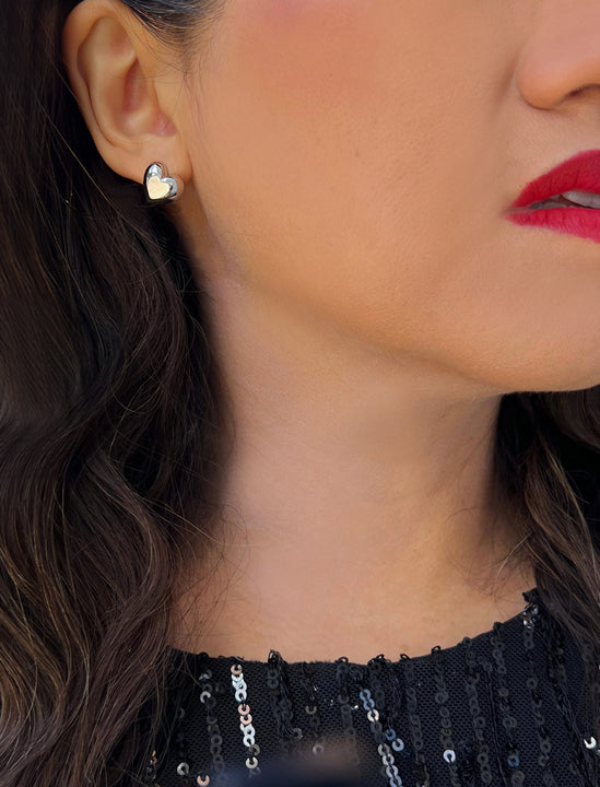 Woman wearing Puffy Heart Stud Earrings in Sterling Silver by AAPI Asian Celebrity Jewelry Designer Sonia Hou - Perfect for Valentine's Day Gift, Mother's Day, Anniversary