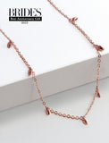 Female model wearing inclusive Asian inspired thin Rice bead minimalist chain layering stacking necklace in 18K rose gold vermeil with a 925 sterling silver base by Sonia Hou, a celebrity Chinese AAPI demi-fine jewelry designer