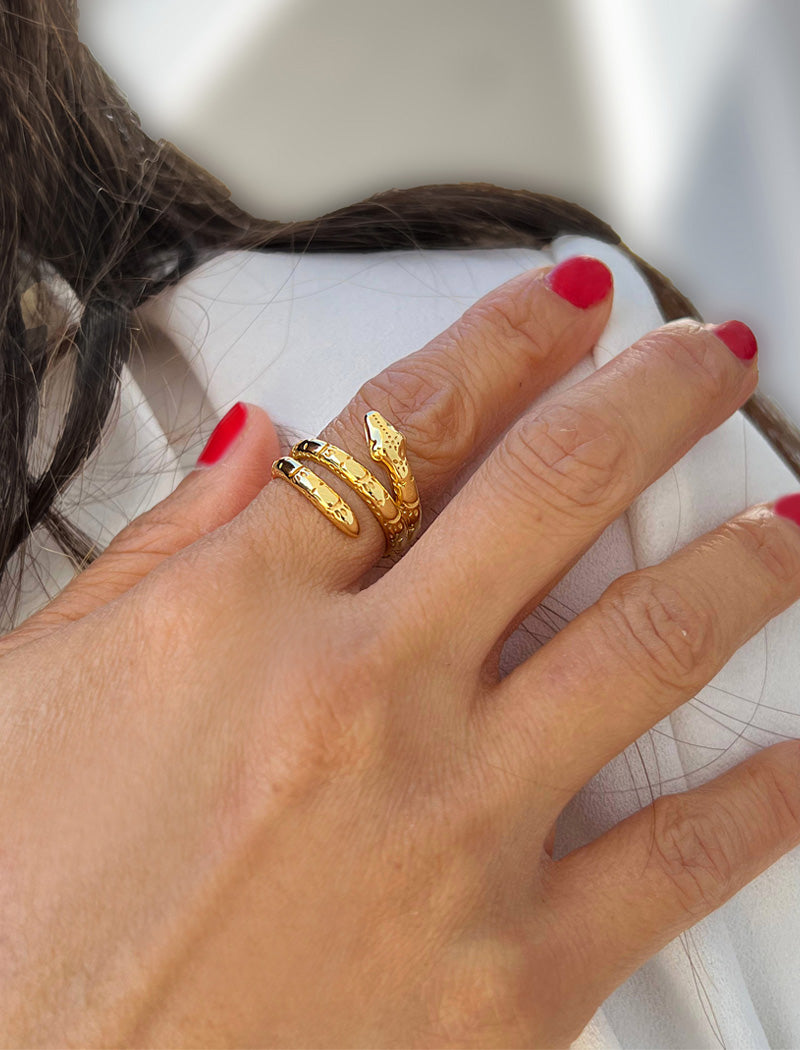 Woman wearing Culturally inclusive Chinese Zodiac Wood Snake x Taylor Swift inspired Reputation ring in 18k gold over Sterling Silver by Sonia Hou, a celebrity AAPI Chinese demi-fine jewelry designer. Perfect for Halloween, Lunar New Year or Swifties at Taylor Swift concerts!