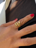 Woman wearing Culturally inclusive Chinese Zodiac Wood Snake x Taylor Swift inspired Reputation ring in 18k gold over Sterling Silver by Sonia Hou, a celebrity AAPI Chinese demi-fine jewelry designer. Perfect for Halloween, Lunar New Year or Swifties at Taylor Swift concerts!