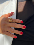 Woman wearing Culturally inclusive Chinese Zodiac Wood Snake x Taylor Swift inspired Reputation ring in 18K Gold over Sterling Silver by Sonia Hou, a celebrity AAPI Chinese demi-fine jewelry designer. Perfect for Halloween, Lunar New Year or Swifties at Taylor Swift concerts!