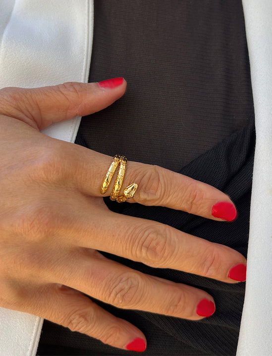 Woman wearing Culturally inclusive Chinese Zodiac Wood Snake x Taylor Swift inspired Reputation ring in 18k gold over Sterling Silver by Sonia Hou, a celebrity AAPI Chinese demi-fine jewelry designer. Perfect for Halloween, Lunar New Year or Swifties at Taylor Swift concerts!