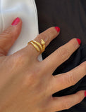 Woman wearing Culturally inclusive Chinese Zodiac Wood Snake x Taylor Swift inspired Reputation ring in 18K Gold over Sterling Silver by Sonia Hou, a celebrity AAPI Chinese demi-fine jewelry designer. Perfect for Halloween, Lunar New Year or Swifties at Taylor Swift concerts!