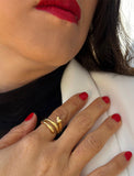 Woman wearing Culturally inclusive Chinese Zodiac Wood Snake x Taylor Swift inspired Reputation ring in 18K Gold over Sterling Silver by Sonia Hou, a celebrity AAPI Chinese demi-fine jewelry designer. Perfect for Halloween, Lunar New Year or Swifties at Taylor Swift concerts!