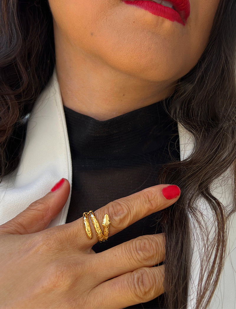 Woman wearing Culturally inclusive Chinese Zodiac Wood Snake x Taylor Swift inspired Reputation ring in 18k gold over Sterling Silver by Sonia Hou, a celebrity AAPI Chinese demi-fine jewelry designer. Perfect for Halloween, Lunar New Year or Swifties at Taylor Swift concerts!