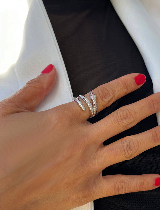 Woman wearing Culturally inclusive Chinese Zodiac Wood Snake x Taylor Swift inspired Reputation ring in Sterling Silver by Sonia Hou, a celebrity AAPI Chinese demi-fine jewelry designer. Perfect for Halloween, Lunar New Year or Swifties at Taylor Swift concerts!