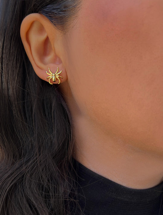 Female model wearing Gold Spider Halloween Earrings in 18K gold over Sterling Silver by AAPI Celebrity Jewelry Designer Sonia Hou 