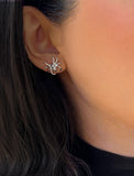 Female model wearing Silver Spider Halloween Earrings in Sterling Silver by AAPI Celebrity Jewelry Designer Sonia Hou 