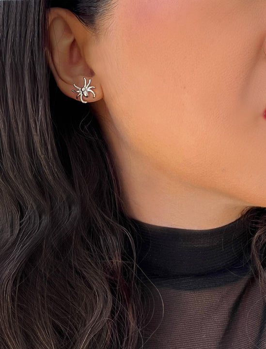 Woman wearing Silver Spider Halloween Earrings in Sterling Silver by AAPI Celebrity Jewelry Designer Sonia Hou 