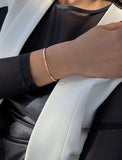 Female model wearing Success 2 Way Convertible 18K Rose Gold Vermeil Thin Cuff Bangle Bracelet by Sonia Hou Jewelry