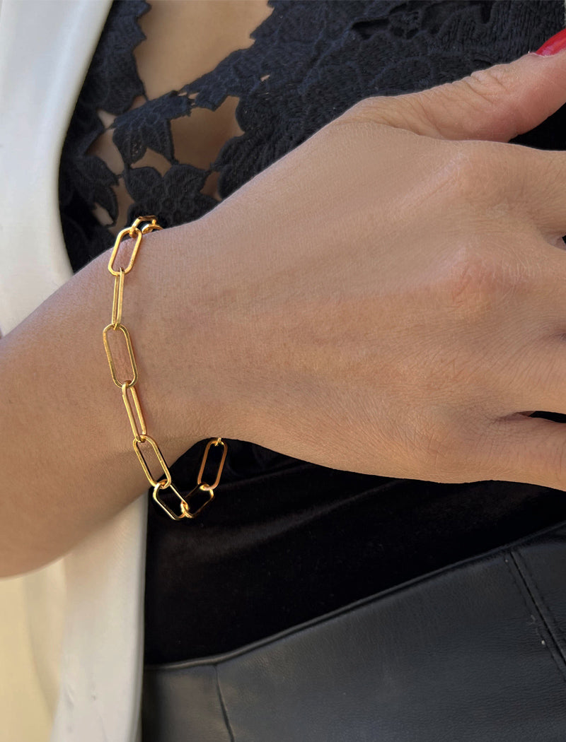 Female Model wearing Essential Minimalist Large Bold Thick Chunky Link Chain Paperclip Layering Stacking Statement Bracelet in 18K Gold Vermeil With Sterling Silver base by Sonia Hou, a celebrity Chinese AAPI demi-fine jewelry designer