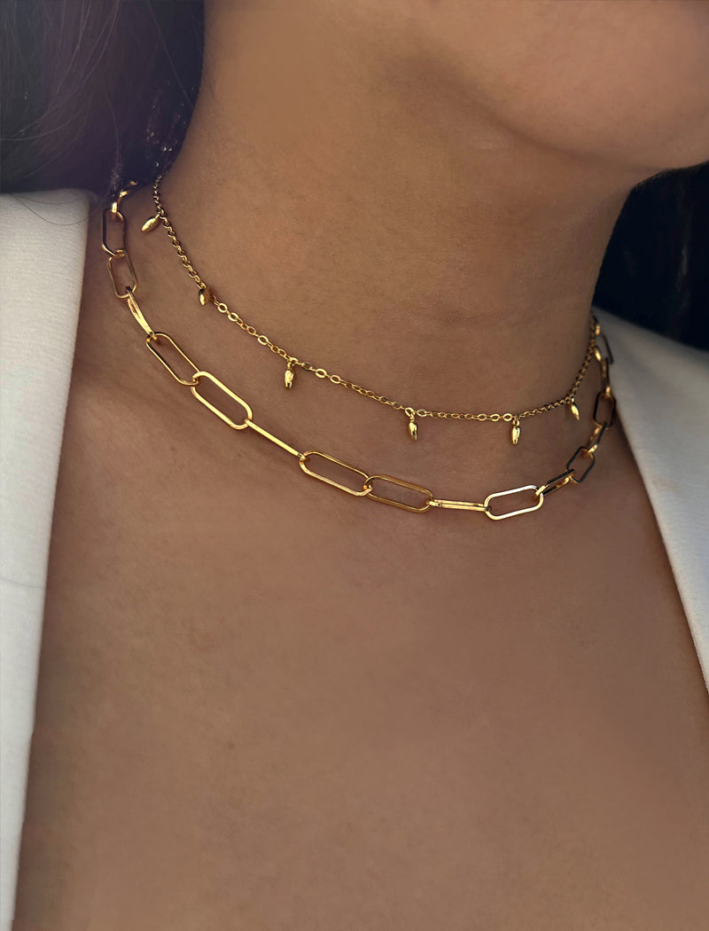 Female model wearing inclusive Asian Inspired Thin Rice Bead Minimalist Chain Layering Stacking Necklace in 18K Gold Vermeil With Sterling Silver base by Sonia Hou, a celebrity AAPI Chinese demi-fine jewelry designer