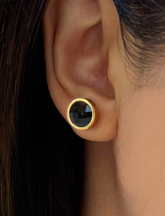 Female model wearing luxe minimalist small or big FIRE 3-Way Convertible Black Onyx Gemstone Round Stud earrings in 24K Gold by Sonia Hou, a celebrity AAPI Asian Chinese demi-fine fashion costume jewelry designer. 