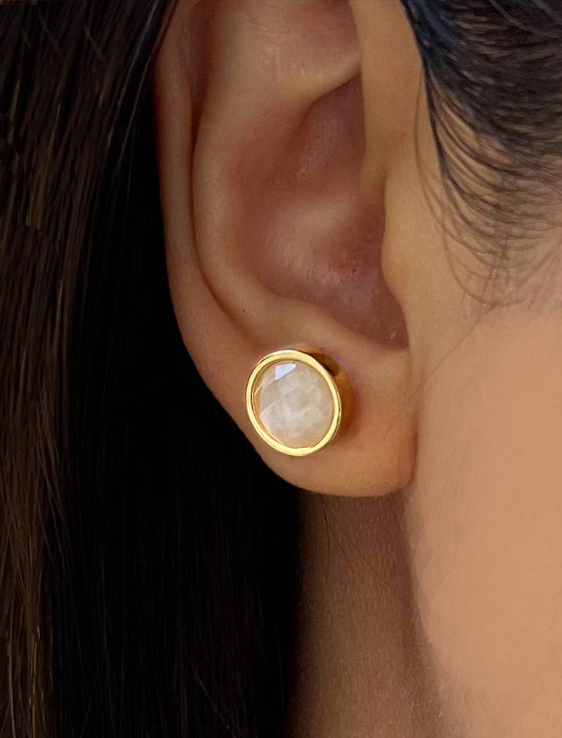 Female model wearing luxe minimalist small or big FIRE 3-Way Convertible White Quartz Gemstone Round Stud earrings in 24K Gold by Sonia Hou, a celebrity AAPI Asian Chinese demi-fine fashion costume jewelry designer. 