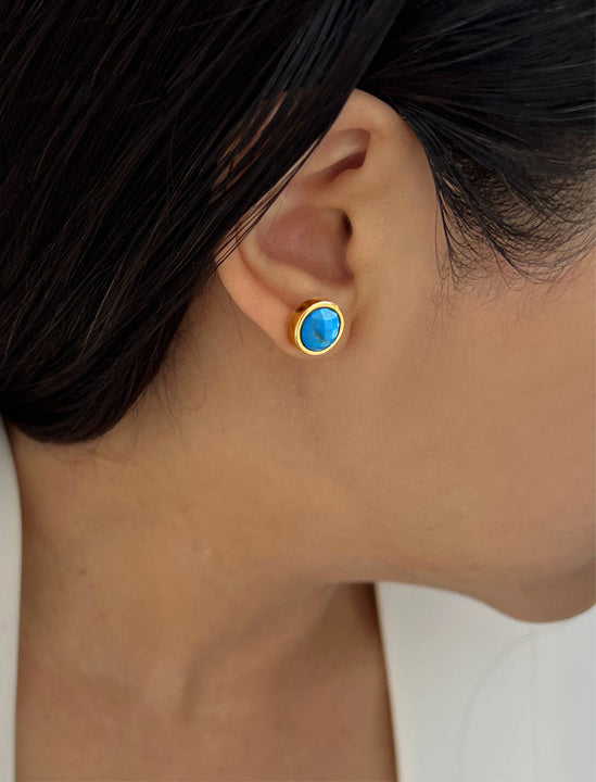 Female model wearing luxe minimalist small or big FIRE 3-Way Convertible Turquoise Gemstone Round Stud earrings in 24K Gold by Sonia Hou, a celebrity AAPI Asian Chinese demi-fine fashion costume jewelry designer. 