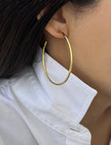 Woman wearing PERFECT Gold Hoop Earrings in 18K Gold Vermeil - Sterling Silver base -  by SONIA HOU Jewelry