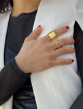 Female model wearing stacking Thin Wavy Noodle Ring in 18K Gold Vermeil by Sonia Hou Jewelry