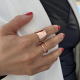 Female model wearing Asian Inspired Thin Wavy Ramen Noodle Stacking Ring in 18K Rose Gold Vermeil with Sterling Silver base by Sonia Hou, a celebrity AAPI Chinese demi-fine jewelry designer