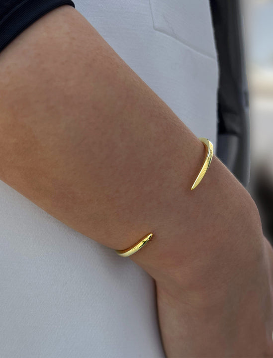 Female model wearing Success 18K Gold Vermeil Sterling Silver Thin 2-Way Cuff Band Bangle Stacking Bracelet by Sonia Hou Jewelry