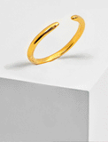 Female model wearing adjustable minimalist Success Simple Midi Thick Chunky Thin Bold Layering Stacking Statement 2 Way Convertible Band Open Ring in 18K Gold Vermeil with sterling silver base by Sonia Hou, a celebrity AAPI Chinese demi-fine fashion costume jewelry designer