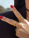 Female model wearing Success Thin Stacking Ring in 18K Gold Vermeil by Sonia Hou Jewelry 