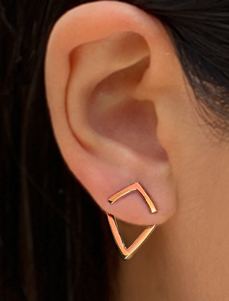 Female model wearing small modern geometric minimalist simple 2-way convertible TRILL dainty wishbone diamond front back ear jacket stud earrings in 18K rose gold vermeil with 925 sterling silver base by Sonia Hou, a celebrity AAPI Chinese demi-fine fashion costume jewelry designer